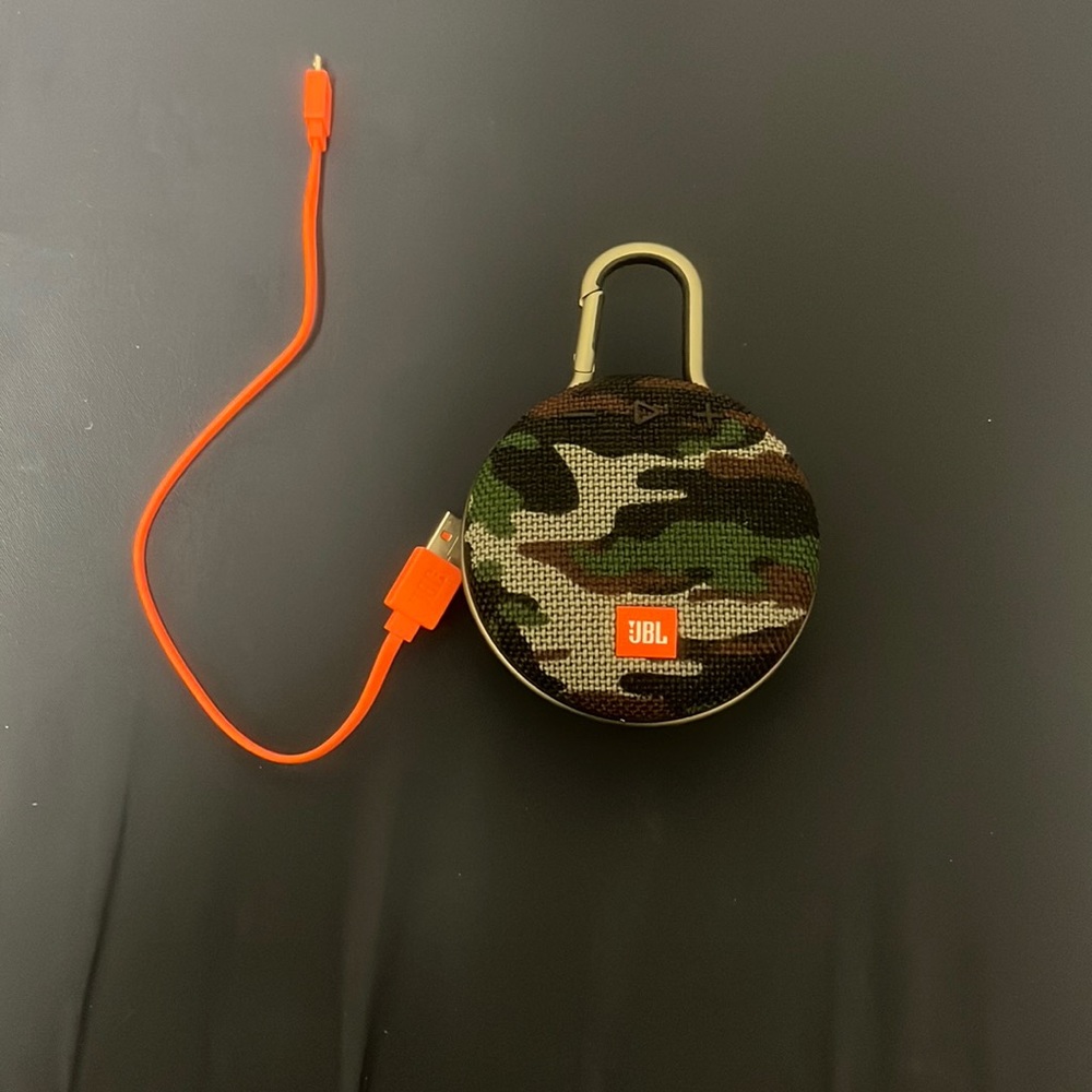 Camouflage JBL portable speaker with charging cable